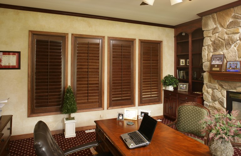 Wooden plantation shutters in a Denver home office